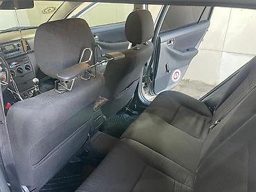 Toyota: Toyota Corolla: 1.4 l | 2005 il Universal — 13