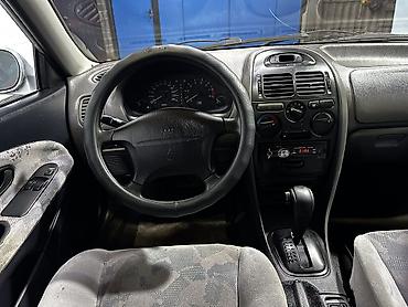pajero pinin: Mitsubishi Carisma: 1999 г., Автомат, Бензин, Хэтчбэк — 3