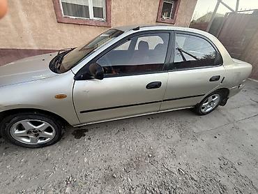 hozon neta l: Mazda 323: 1996 г., 1.5 л, Автомат, Бензин, Седан — 4