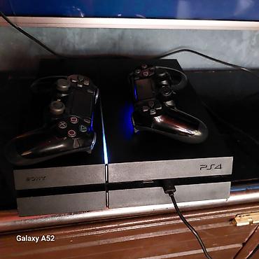 Sony PlayStation 4 (PS4) oyun konsolu - Komplekt: 2 ədəd DualShock 4