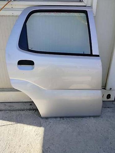 Auto-delovi: ZADNJA DESNA VRATA ZA SUZUKI IGNIS OD 2003. DO 2008. GOD. | Zadnja — 1