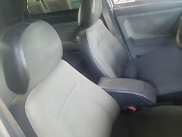 radiator opel astra g: LADA 112, gümüşü rəng, hetçbek kuzov. Xüsusiyyətlər: - 5 qapı, geniş — 8