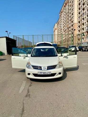 Nissan: Nissan Tiida: 1.5 l | 2011 il Hetçbek