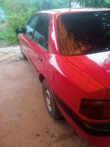 mb 220: Mazda 323: 1992 г., Седан — 5