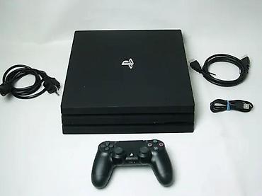 second hand shop electronics: U ponudi je Sony PlayStation 4 sa naslova. Konzola je novija FAT — 2