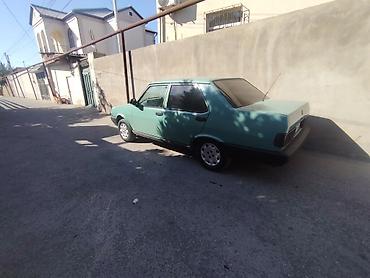 Tofas: Model: Tofaş Şahin (sedan) Kuzov: 4 qapılı, açıq yaşıl rəng Yanacaq — 3
