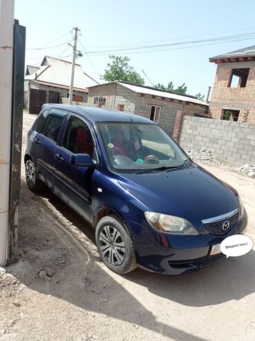 токмок автомобил: Mazda Demio: 2003 г., 1.3 л, Автомат, Бензин, Седан