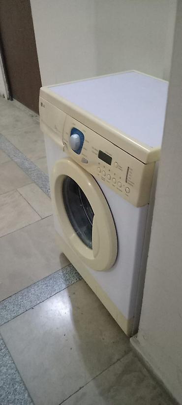 hamam kranti: LG ön yükləməli paltaryuyan maşın - Tutum: 5 kq (paneldə qeyd olunub) — 4