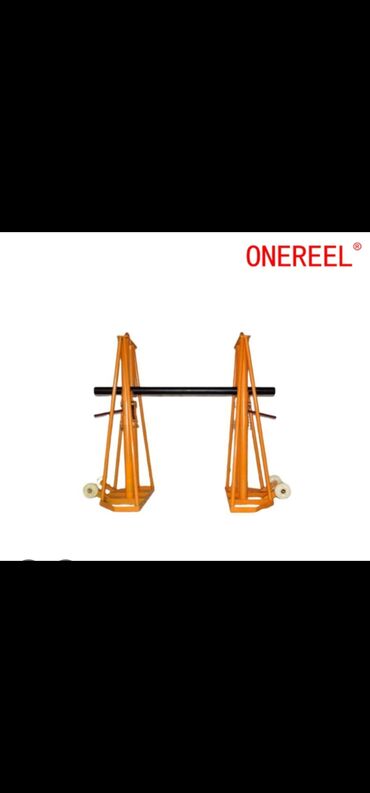Saz: Kabel barabanı üçün dayaq və açıcı stendi. -Kabel barabanı açan - İki