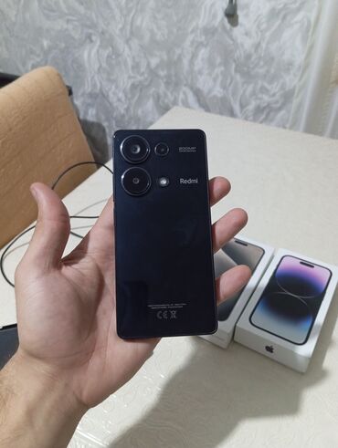 Redmi: Redmi smartfon - Rəng: qara, parlaq arxa panel - Kamera: arxada çoxlu — 2