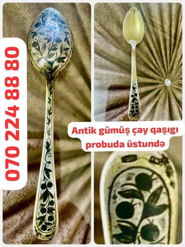 qaşiq: Dekorativ qaşıq, üzərində bitki motivləri ilə oyulmuş mürəkkəb dizayna