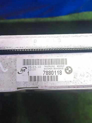 n52: Радиаторный модуль BMW E90 (основной радиатор охлаждения + нижний — 2