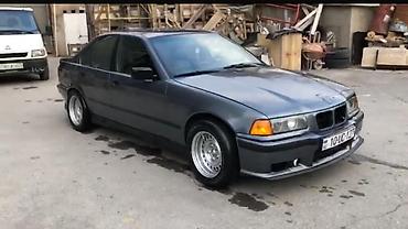 bmw lip: BMW 3 Series E36 sedan – tünd boz rəngdə, klassik kuzov xəttləri ilə — 1