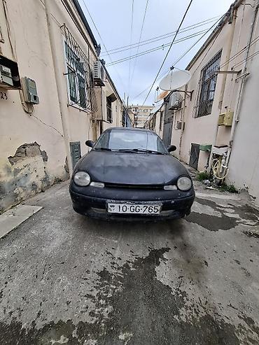 su motosikleti: Chrysler Neon: 2 l | 1997 il 203785 km Sedan — 6