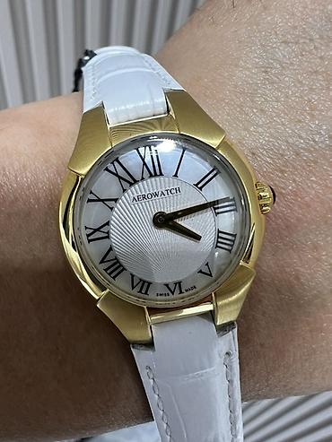 geneva platinum: Aerowatch — швейцарские наручные часы - Корпус: сталь с золотистым — 1
