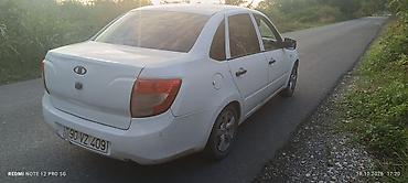 lada siti: Lada Granta sedan – ağ rəng Texniki və xarici xüsusiyyətlər: - Kuzov — 6