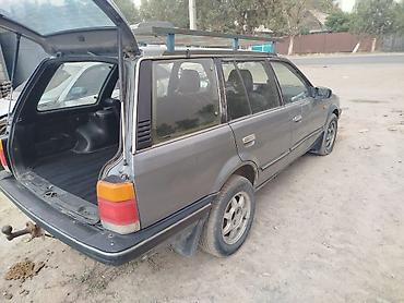Mazda: Mazda 323: 1990 г., Механика, Бензин, Универсал — 5