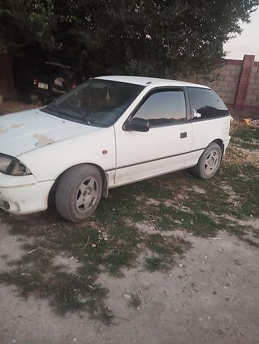 крыло на фит: Suzuki Swift: 1989 г., 1.3 л, Механика, Бензин, Хэтчбэк — 1