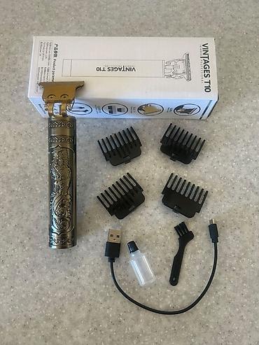 berber ucun: Vintage T10 Professional Trimmer Xüsusiyyətlər: - Kəskin “T-Blade” — 1