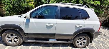 qabaq şüşə: Hyundai Tucson: 4.4 l | 2009 il Krossover — 7