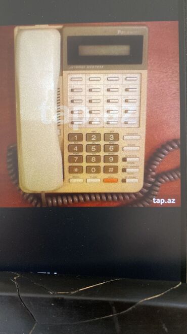 tap az telefonlar: Stasionar telefon Panasonic, Simli, İşlənmiş, Pulsuz çatdırılma