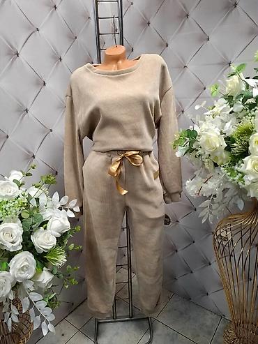 Gornji i donji deo: Damski komplet trenerke – gornji deo i donji deo u istom tonu. - — 4