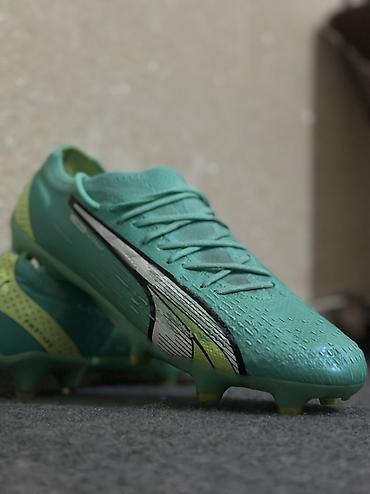 Butslar: Puma futbol butsası – sürət və yüngüllük üçün. - Model: Puma Ultra — 2