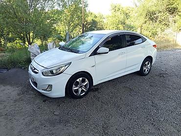 мини электро: Hyundai Solaris: 2012 г., Механика, Седан — 1