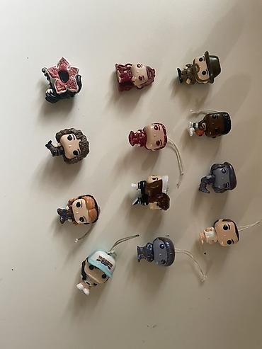 Брелоки: Коллекция мини‑фигурок/брелоков Funko (серия по сериалу Stranger — 1
