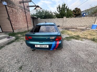 купить авто в рассрочку: Mazda 323: 1994 г., 1.5 л, Механика, Бензин, Хэтчбэк