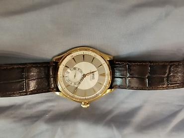 золотой часы: Oris 396-7580-60-51LS — швейцарские механические золотые наручные — 1