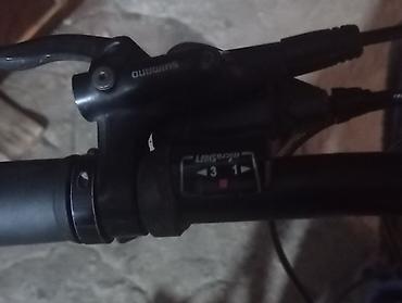 26 velo: Dağ velosipedi – 29” təkərlər, amortizatorlu çəngəl və Shimano — 4