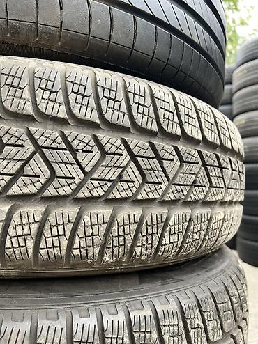 stud 100: Шины 215 / 65 / R 17, Всесезонная, Б/у, Комплект, Германия, Pirelli — 2