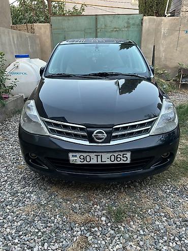 Транспорт: Nissan Tiida: 1.5 л | 2011 г. Хэтчбэк — 2