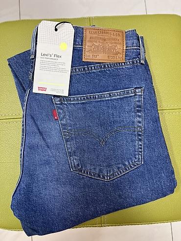 Джинсы: Levi’s 512 Slim Taper — мужские джинсы с заужением к низу. - Линия — 3