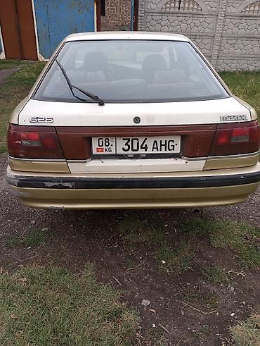 ом 615: Mazda 626: 1994 г., 0.2 л, Механика, Бензин, Седан — 2