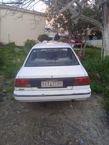 Nissan: Nissan Sunny: 1.6 l. | 1991 έ. Λιμουζίνα — 2