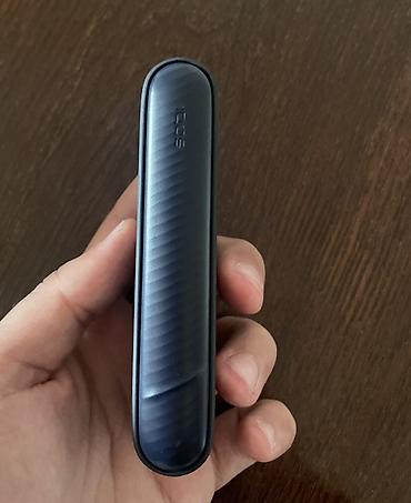 qara halile: IQOS elektron tütün qızdırıcısı, qara rəngdə, kompakt və zərif dizayna — 3