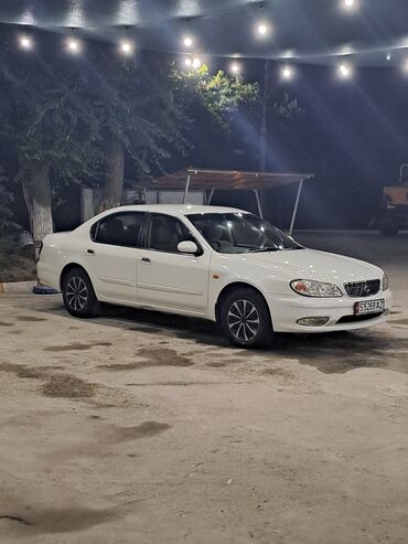 тез сат ош: Автомобиль Nissan Cefiro белого цвета. Кузов типа седан. обмен не