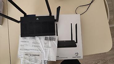 Modemlər və şəbəkə avadanlıqları: Wi‑Fi router – Dual Band AC1200, 4 antenalı, Easy Mesh dəstəyi — 1