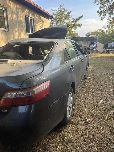audi c4: Toyota Camry (XV40), седан, комплектация LE, темно-серый цвет — 1