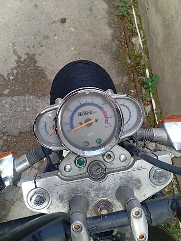 zarya: Kruizer tipli motosiklet Xüsusiyyətlər: - Tək silindrli benzin — 4