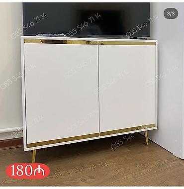 Ağ rəngdə, minimal dizaynlı iki qapılı dolab/TV altlığı. Üst və alt lalafo.az -da Ağ rəngdə, minimal dizaynlı iki qapılı dolab/TV altlığı. Üst və alt