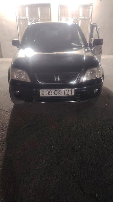 islenmis hyundai avtomobilleri satisi: Honda CR‑V, qara rəng, 1-ci nəsil kuzov (təxmini 1997–2001). - Kuzov — 1