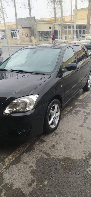 Toyota: Toyota Corolla: 1.4 l | 2004 il Hetçbek