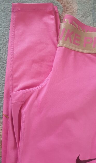 Helanke, biciklistički šortsevi: NIKE pro dri fit original helanke roze boje sa zlatnom debelom gumom — 4