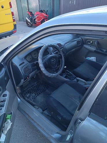 mazda 2000: Mazda 323: 2002 г., 1.6 л, Механика, Бензин, Универсал — 5