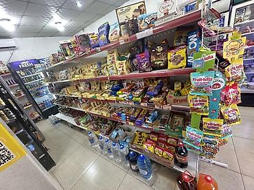 китайский орех: Продуктовый магазин с широким ассортиментом повседневных товаров. - — 5