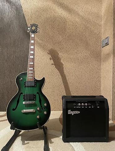 Salam les paul növlü elektro gitardır. Heçbir problemi yoxdu, set lalafo.az -da Salam les paul növlü elektro gitardır. Heçbir problemi yoxdu, set