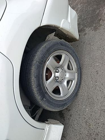 Təkərlər: 4 ədəd avtomobil şini - Ölçü: 215/55 R16 - Yük/sürət indeksi: 93V - — 6